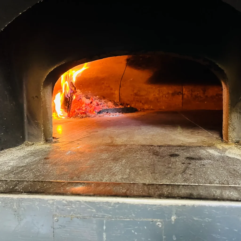 feu de bois pizza del mas